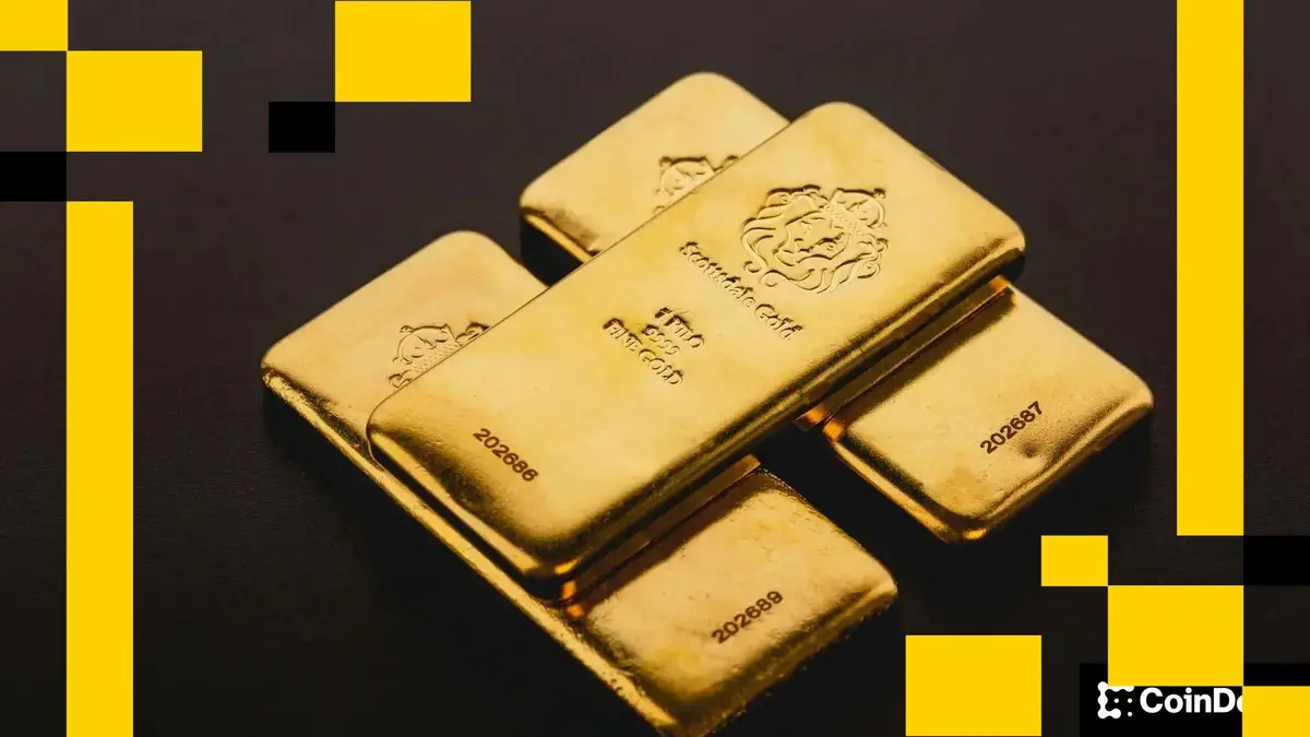 Ouro ultrapassa $5.000 enquanto Bitcoin estagna perto de $87.000 em divisão macro-cripto